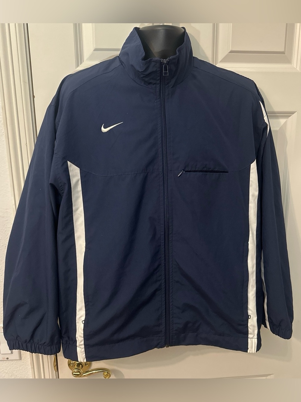 Vintage 1990’s Nike Men’s Navy Track Jacket with White Accents